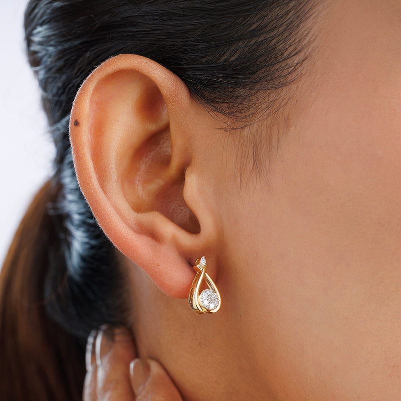 Close-up of a woman’s ear wearing Keemti Jewels AURELIA Stud Earrings—an elegant touch for any workwear look.