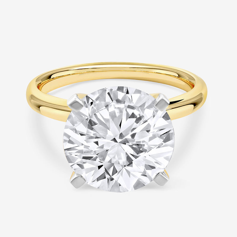 Keemti Jewels ELEGANT Round Solitaire RING with a large diamond in a classic setting on a white background.