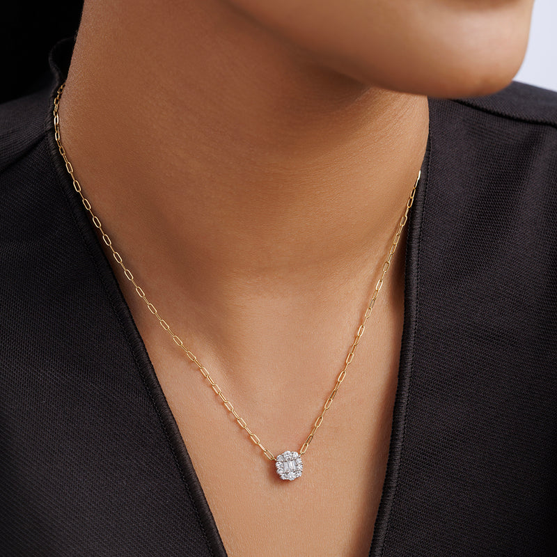 A woman wears the Keemti Jewels CLUSTER Charm NECKLET with a black top.