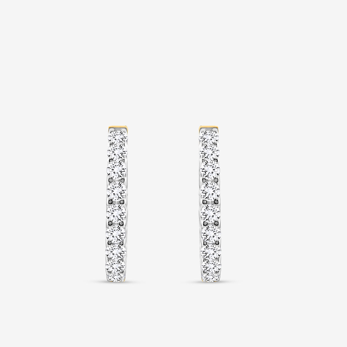 The CLASSIC Glow Huggie EARRINGS by Keemti Jewels are slim gold hoops, shown vertically on a plain white background, with the front encrusted in sparkling diamonds for continuous shimmer.