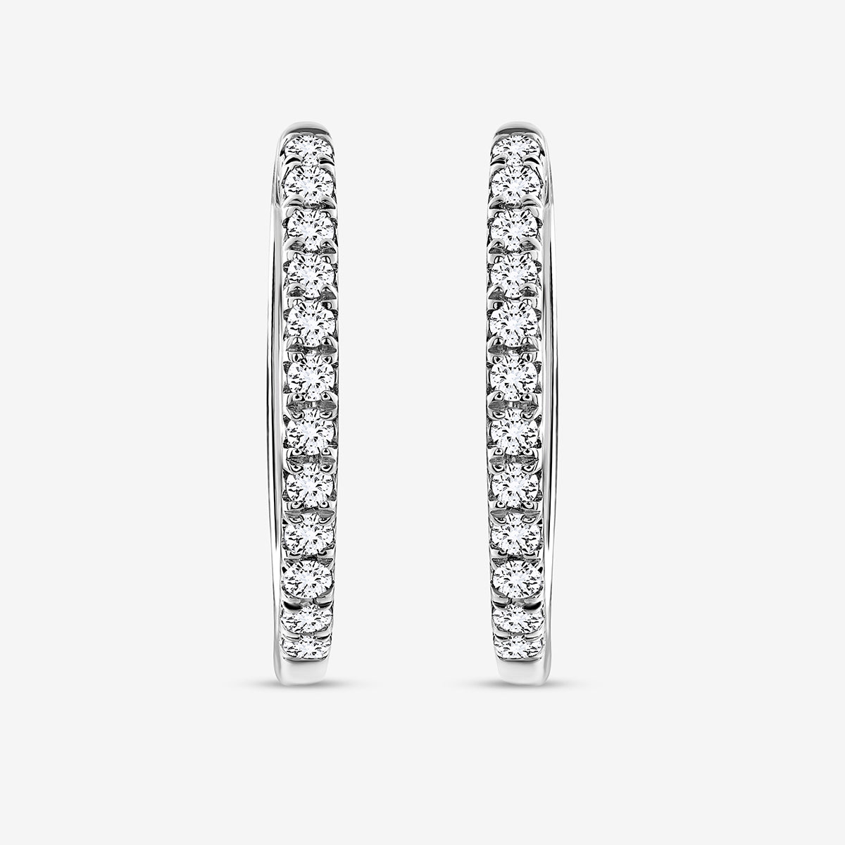 Keemti Jewels SOFT Shine Hoop Earrings feature round diamonds for a continuous sparkle effect.