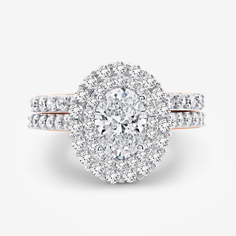Keemti Jewels' ETERNAL Glow Oval Halo ring with pavé band, paired with a sparkling diamond wedding ring.