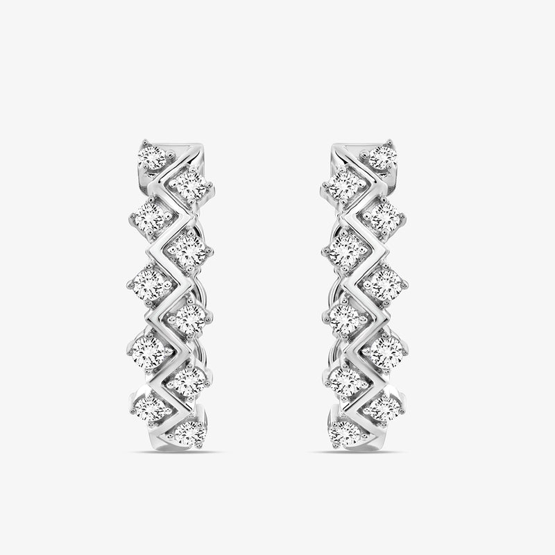 Keemti Jewels ENTWINED Spark Hoop Earrings feature a criss-cross design with sparkling diamonds on a textured silver hoop.