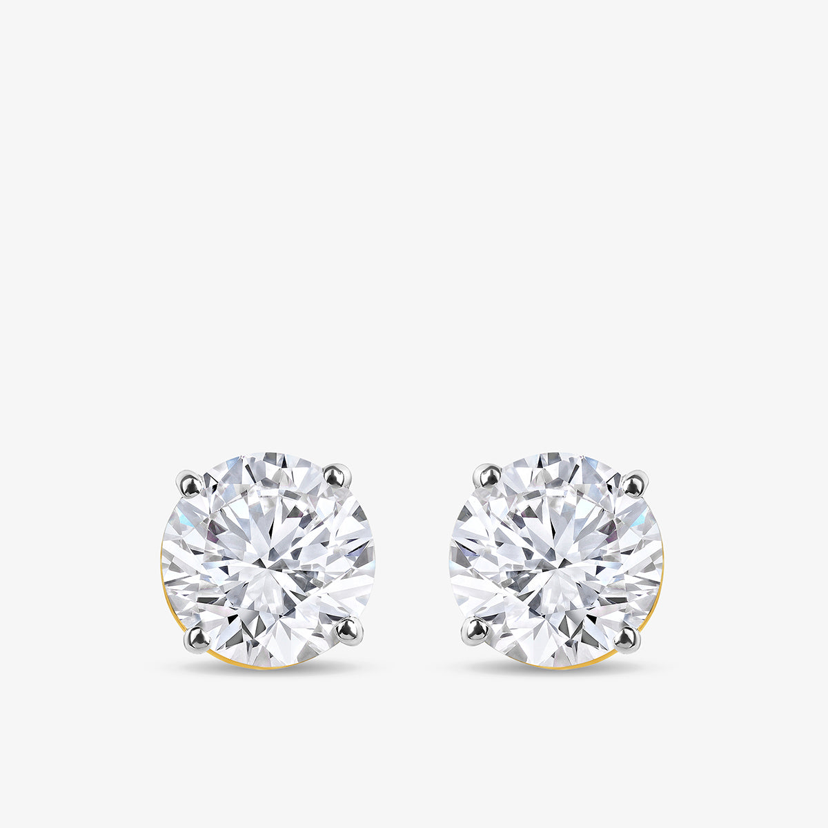 TIMELESS Solitaire Stud Earrings by Keemti Jewels feature sparkling stones in a classic four-prong setting.