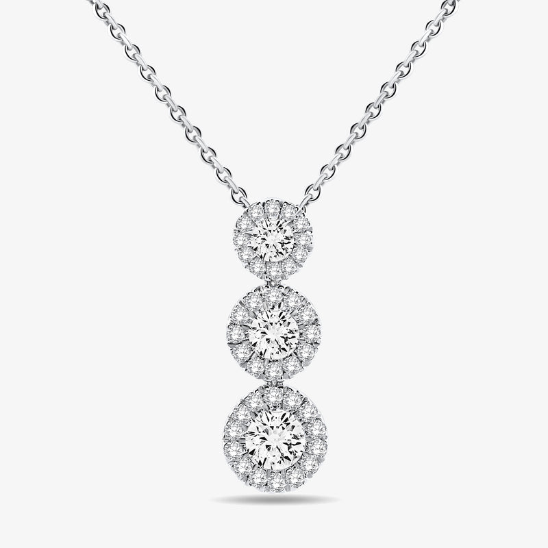 Silver three halo circles stacked on a cable chain pendant necklace.