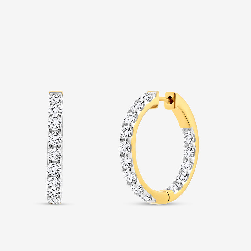 The CLASSIC Glow Huggie EARRINGS by Keemti Jewels feature small round diamonds along the outer edge in a sleek hoop design, shown from both side and front angles against a plain white background.