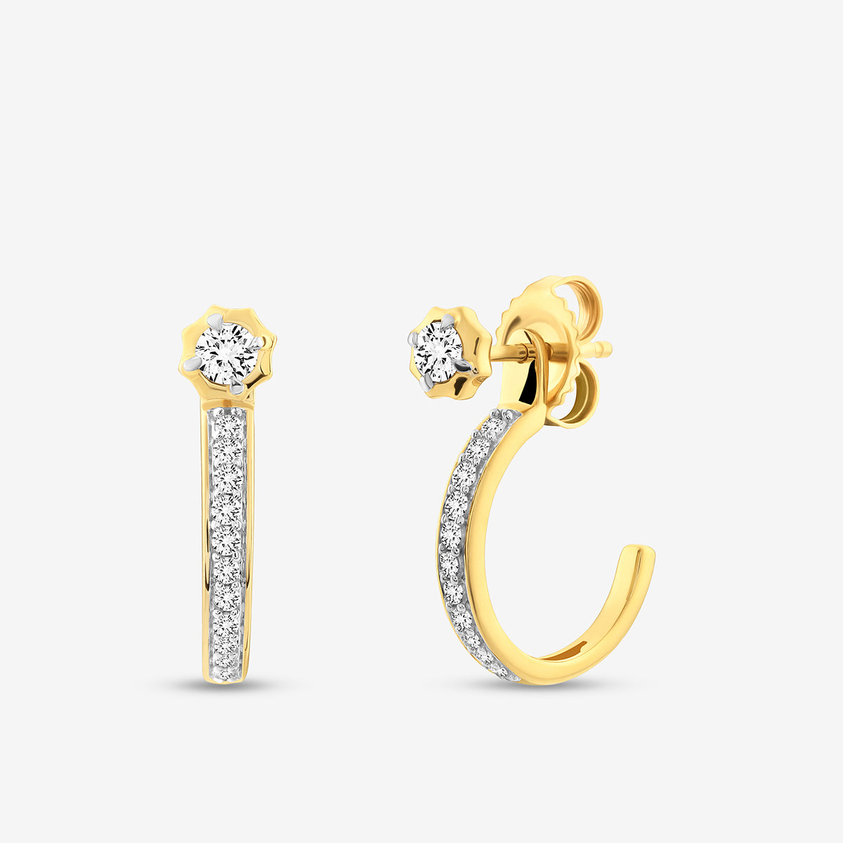 Keemti Jewels’ AURA Dew Ear JACKETS feature gold diamond drops with a halo-set top and two-tone sparkle.
