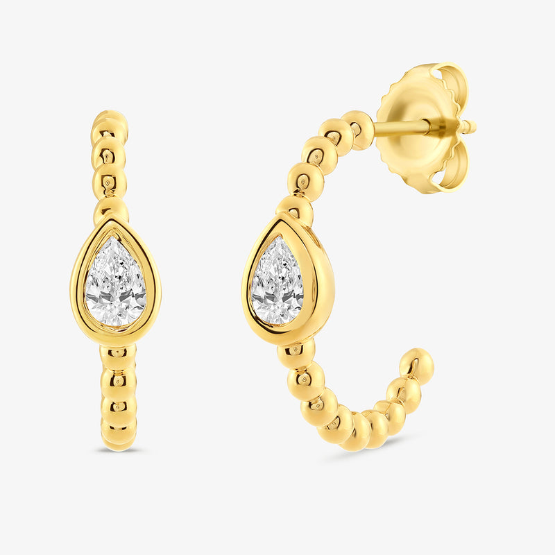 LUNA pear hoop earrings shown from the side, gold vermeil teardrop crystal bezel