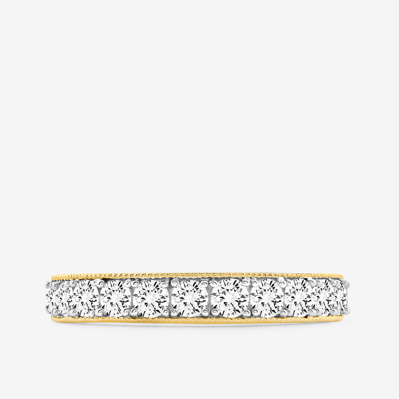 Oval pavé ring with clear stones and gold-tone edges on a silver-tone band