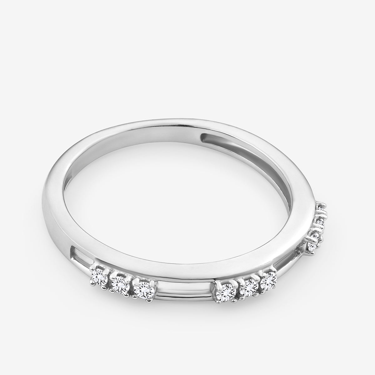 The MINIMAL Channel Set RING by Keemti Jewels features a slim band with small round diamonds along the top edge.