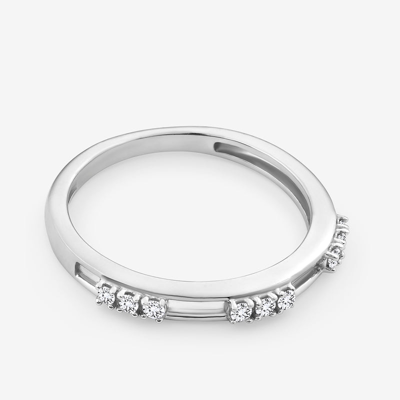 The MINIMAL Channel Set RING by Keemti Jewels features a slim band with small round diamonds along the top edge.