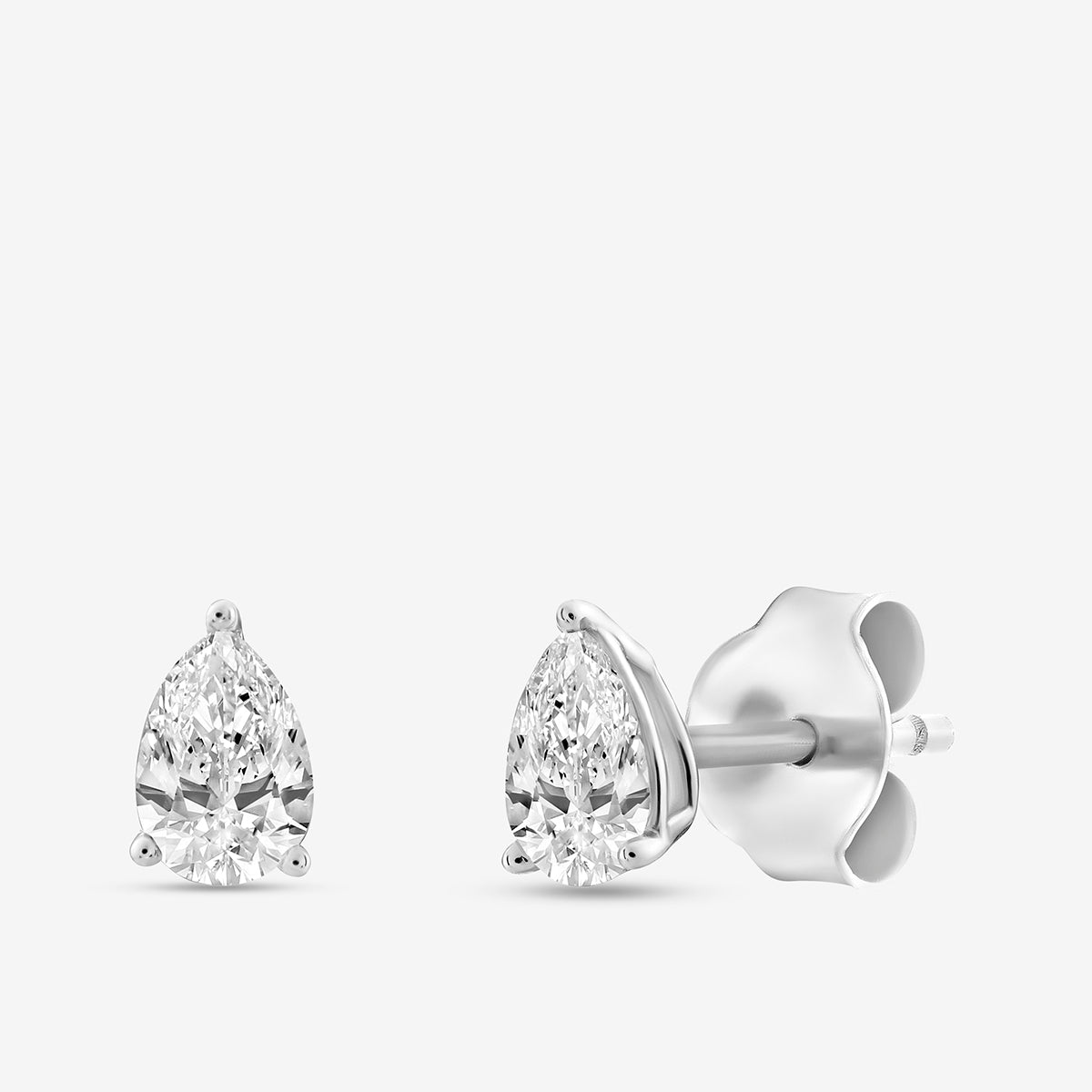 PEARLUXE Solitaire Stud Earrings by Keemti Jewels: pear-shaped, prong set, butterfly backs, timeless shine.