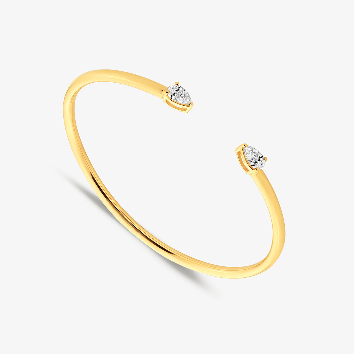 Keemti Jewels PEAR Luxe BRACELET: slim gold open band with polished curve and pear-shaped diamond teardrop ends.