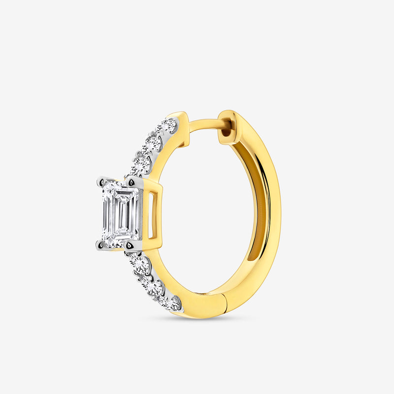 The AERIS Emerald Huggie Earrings by Keemti Jewels feature a gold hoop with emerald-cut stones and sparkling diamonds.