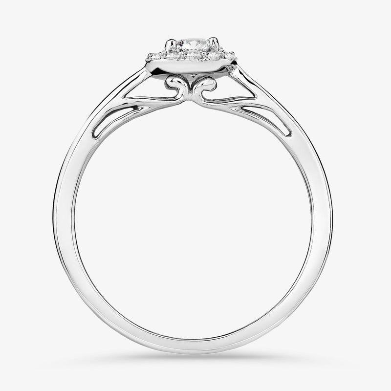 Side view of halo solitaire ring in silver vermeil with prong-set round center stone