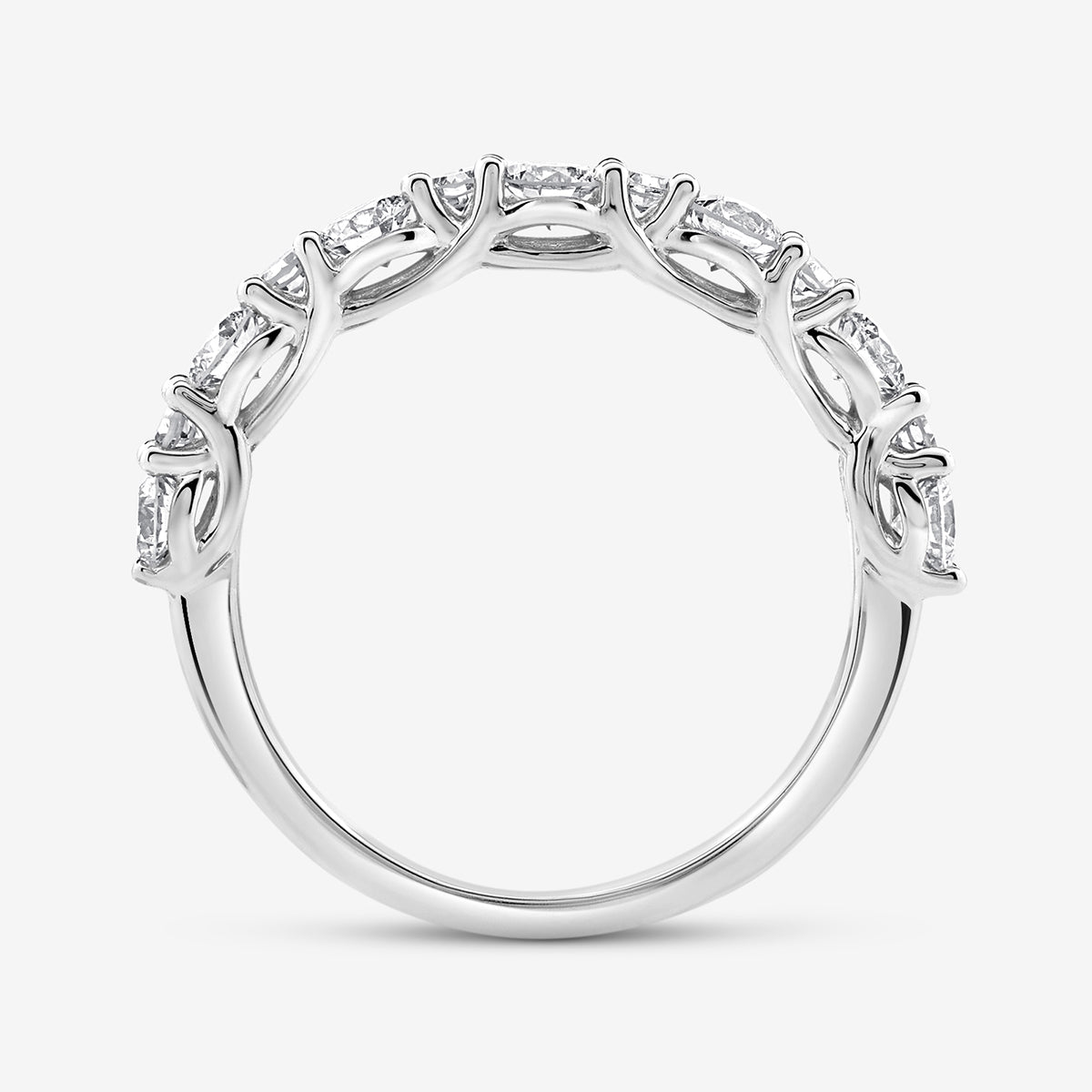 The GEOMETRIC Eternity RING by Keemti Jewels features round diamonds in a vine-like, decorative prong setting.