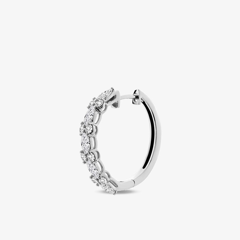 Keemti Jewels ELARA Shine Hoop Earrings feature a curved design with sparkling gemstones, shown on a white background.