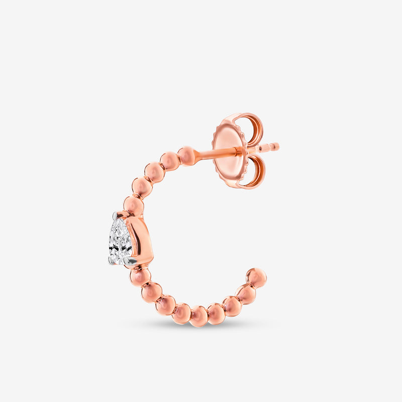 Pear hoop earring view from side: rose-gold bead band with pear-cut clear stone
