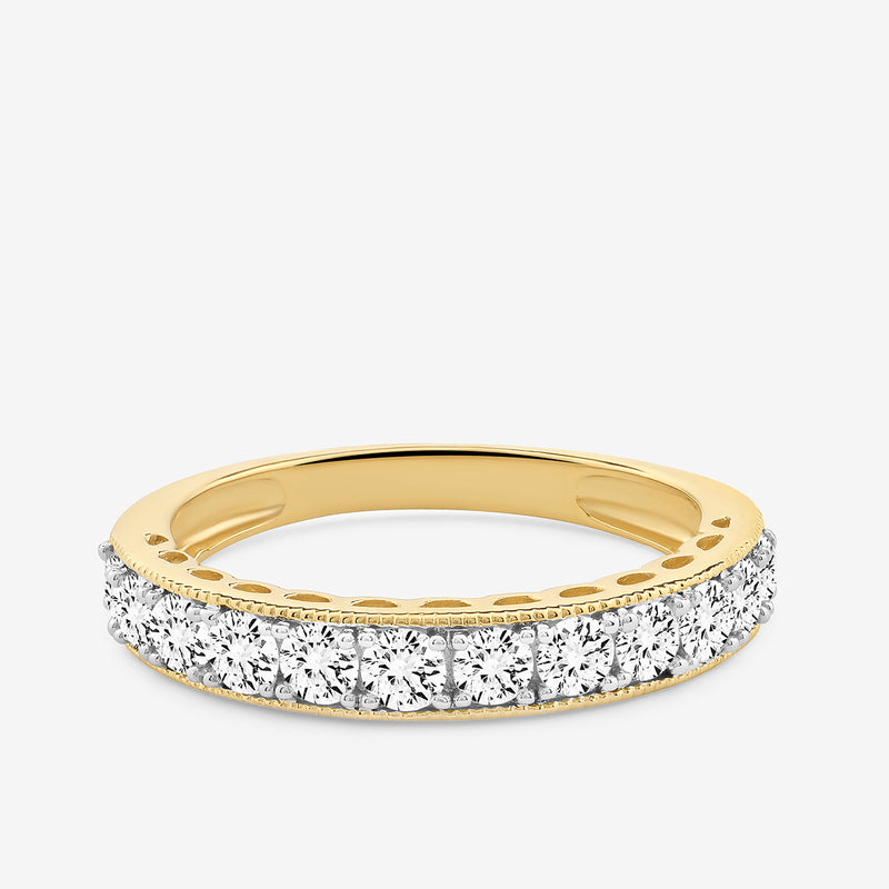 Oval ring top view: clear stone pavé band with gold-tone inner bezel detail