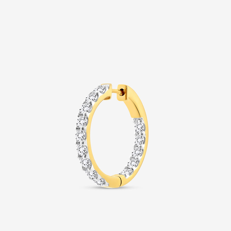 The CLASSIC Glow Huggie EARRINGS by Keemti Jewels feature a sleek gold hoop design encrusted with small white gemstones along the outer edge, radiating continuous shimmer. Displayed upright against a plain white background.