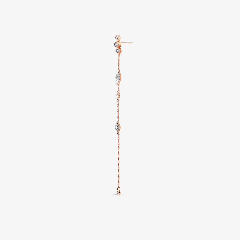 The Keemti Jewels TWINKLE Glow Sui Dhaga Earrings feature delicate rose gold, bezel-set diamonds, and a thin chain.