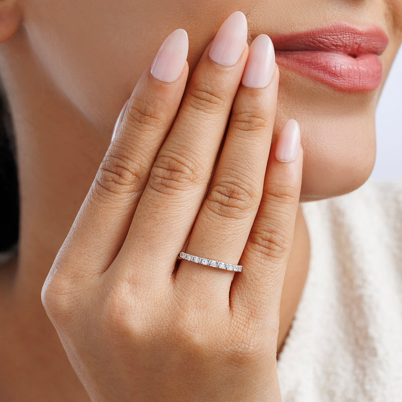 925 sterling silver diamond strip ring on finger, straight row of small stones