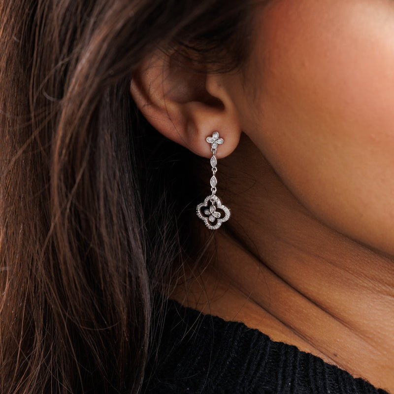 Silver 925 clover drop earring on ear with quatrefoil and oval stone links