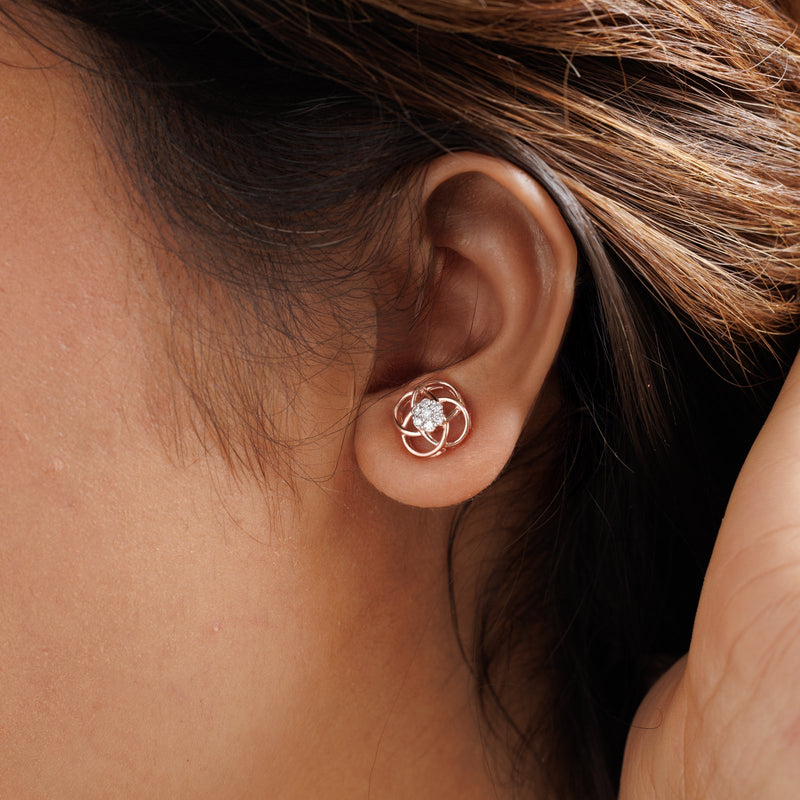 Bloom Knot Stud earrings on ear—rosette knot with round sparkling center