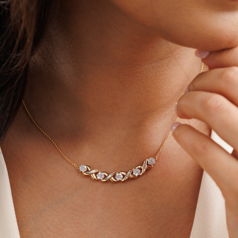 Curved diamond interlinked necklet worn at the collar, gold-tone links with sparkling stones