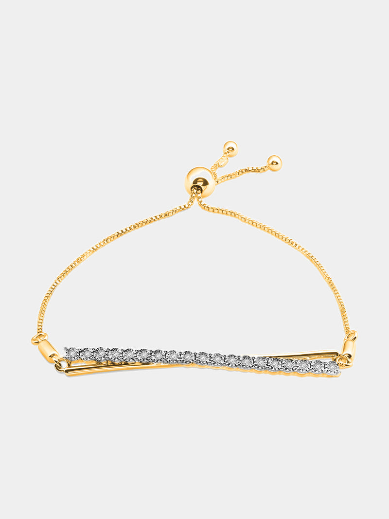Keemti Jewels' Asymmetric Spark Bolo Bracelet with lab-grown diamonds adds glamour to a classic black sweater look.