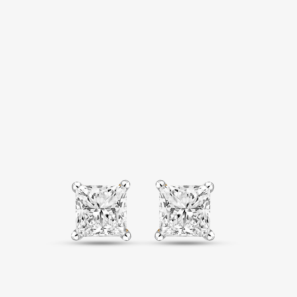Keemti Jewels SQUARELUMIN Solitaire Stud Earrings with princess-cut diamonds and polished prongs on white background.