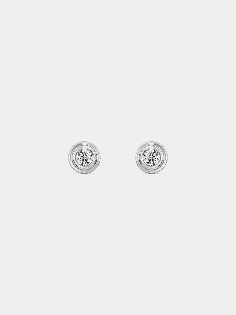 Classic round stud earrings with gold-tone bezel and white sparkling center stone