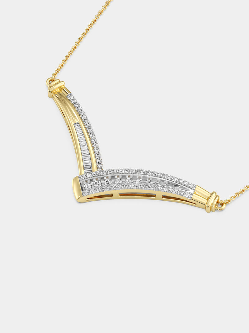 Keemti Jewels Multi-Stone Chevron Necklet with V-shaped pendant, hand on chain, worn over dark clothing.