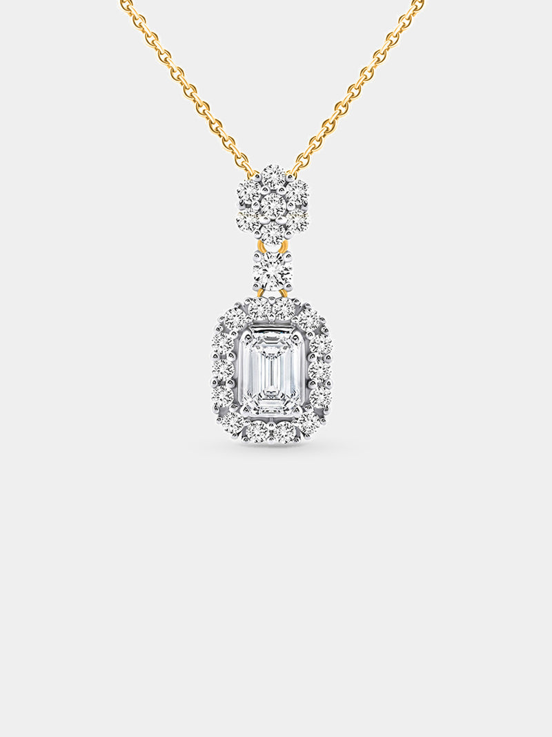 Eternal Emerald Halo Necklet by Keemti Jewels: an emerald-cut diamond pendant on gold, worn over a black top.