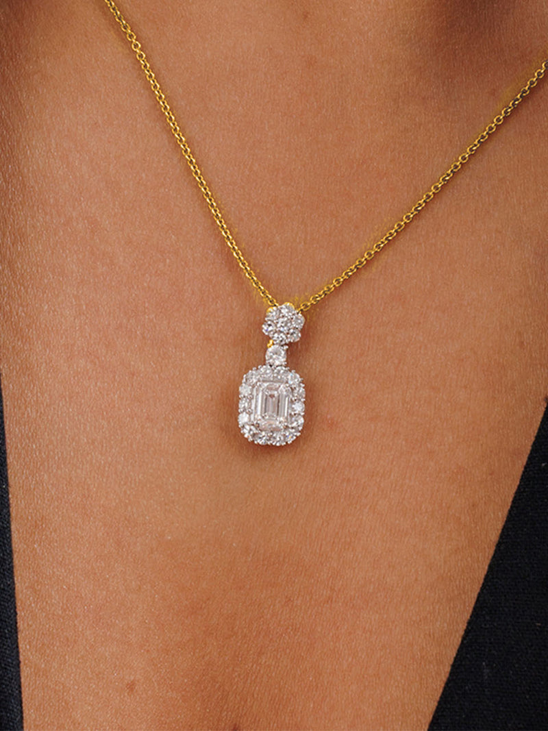 Keemti Jewels' Eternal Emerald Halo Necklet, featuring a delicate emerald pendant, shown on a plain white background.