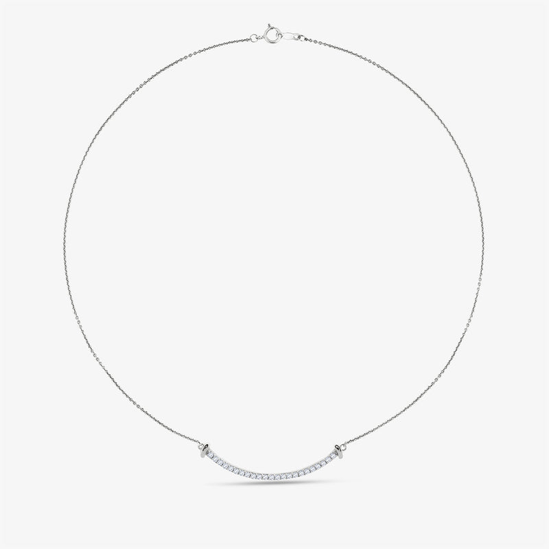Aurelia Arc Necklet by Keemti Jewels: a sleek, thin-chain silver necklace with a curved bar pendant on white.