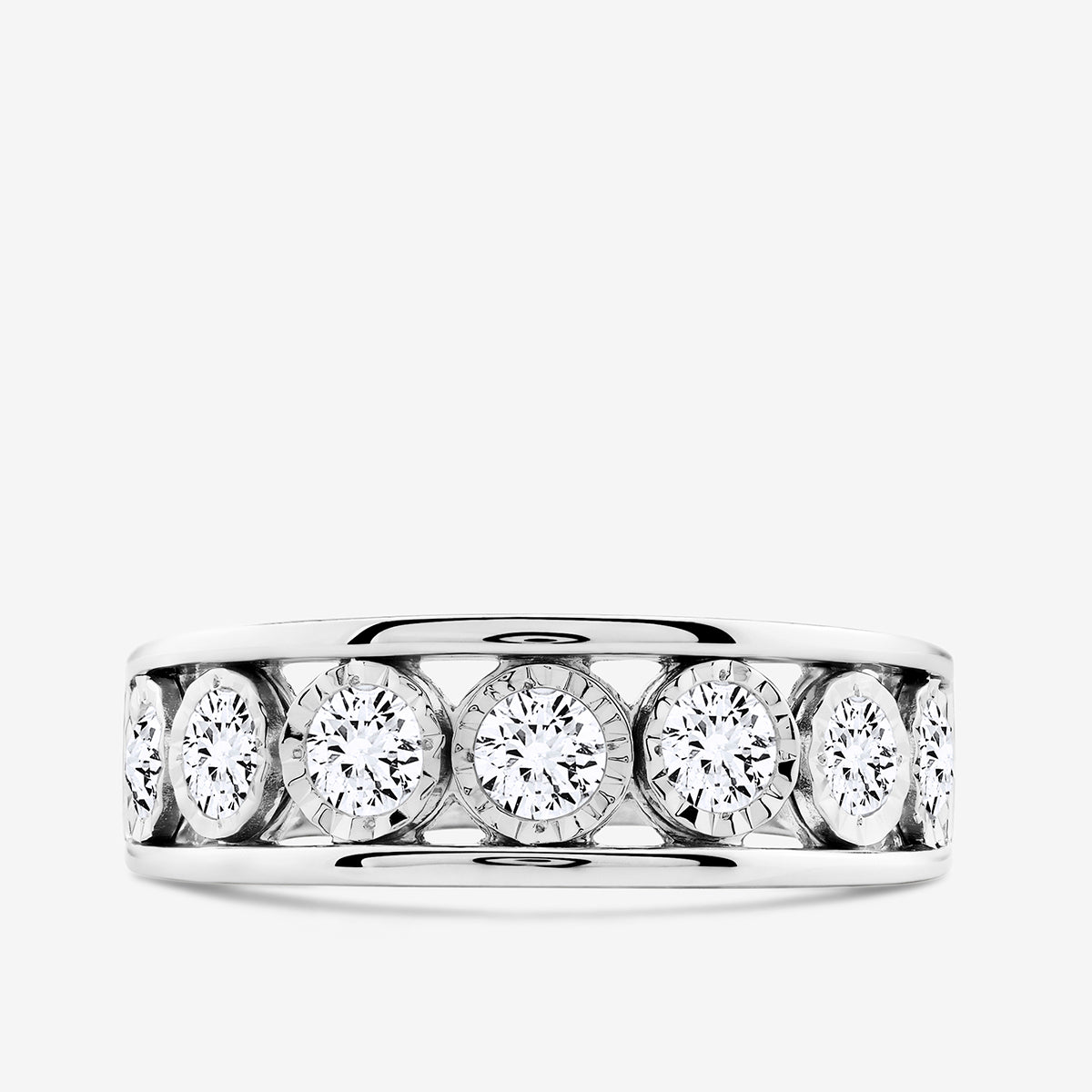 Bezel ring in silver vermeil plating with five round stones across the band