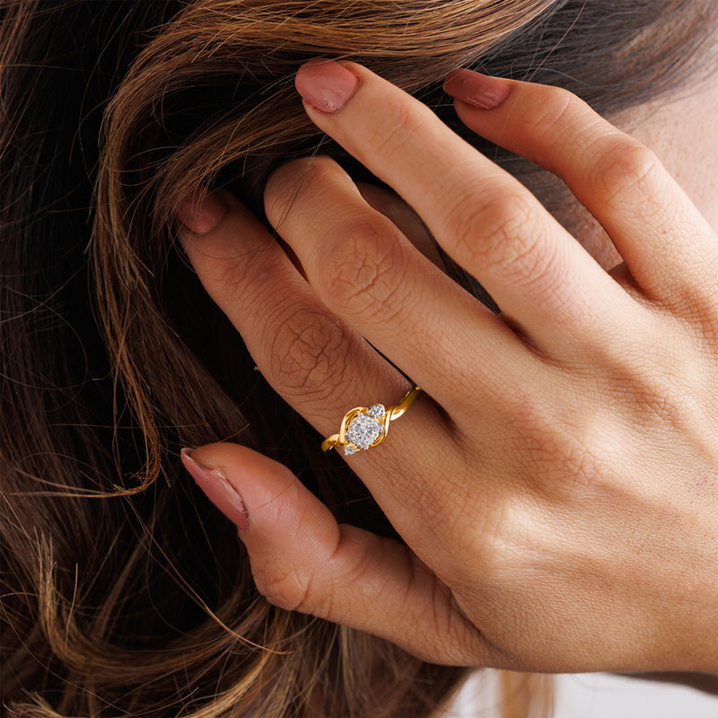 A manicured hand in Keemti Jewels' Two-Tone Accent Ring with an oval stone gently touches flowing hair.