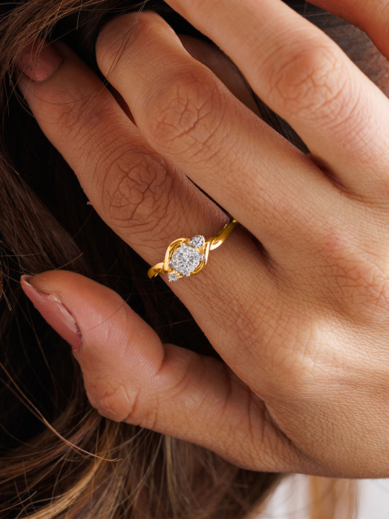 A manicured hand in Keemti Jewels' Two-Tone Accent Ring with an oval stone gently touches flowing hair.