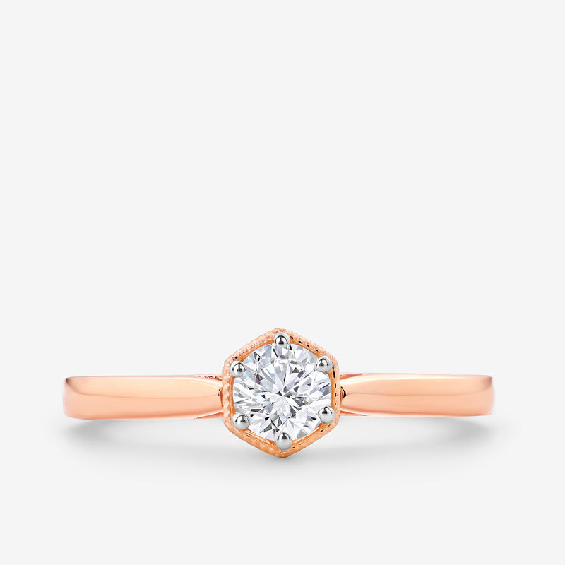 The BLOSSOM Engagement RING by Keemti Jewels features a rose gold hexagon setting and pink band, shown on white.