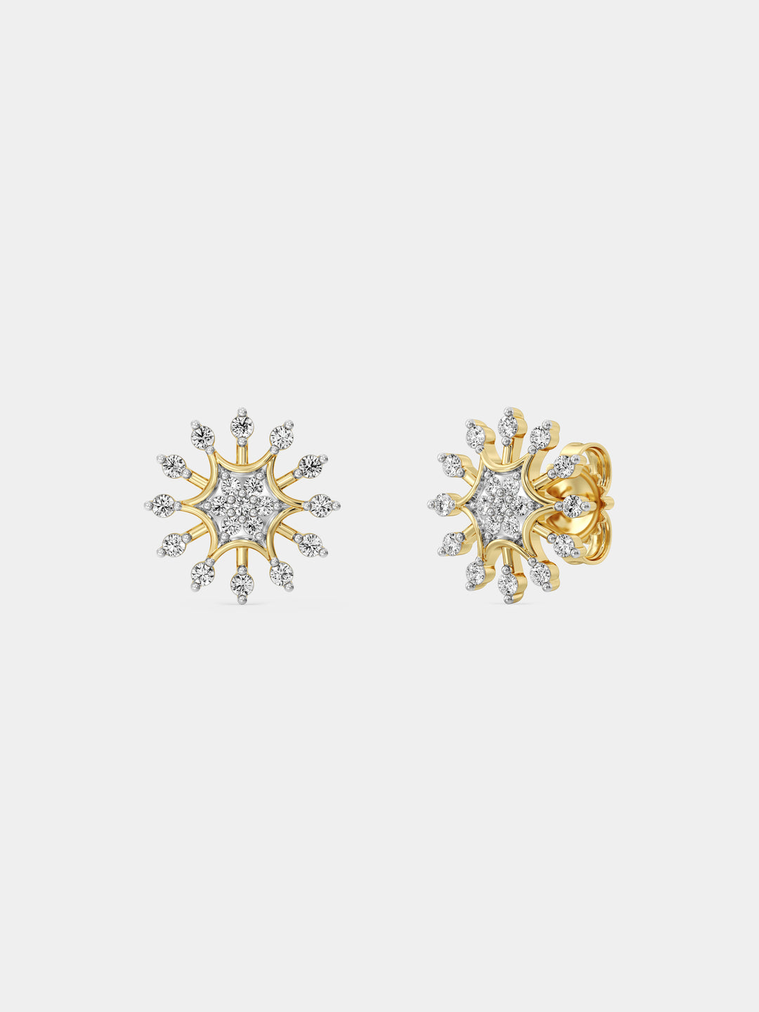 Stud earrings starburst design with silver-tone round stones and gold-toned prongs