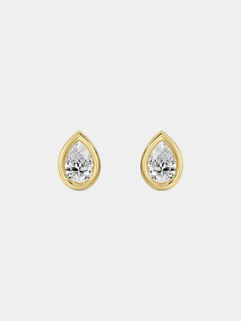 Teardrop glow earrings with pear-shaped crystal in gold-tone bezel