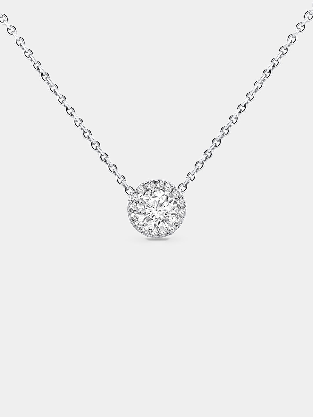 Necklet worn on neckline: round halo pendant on fine silver-tone chain