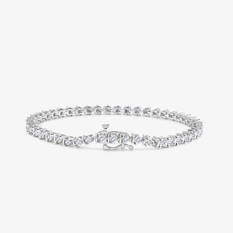 The Minimal Diamond Tennis Bracelet by Keemti Jewels features round white stones and a box clasp, shown on white.
