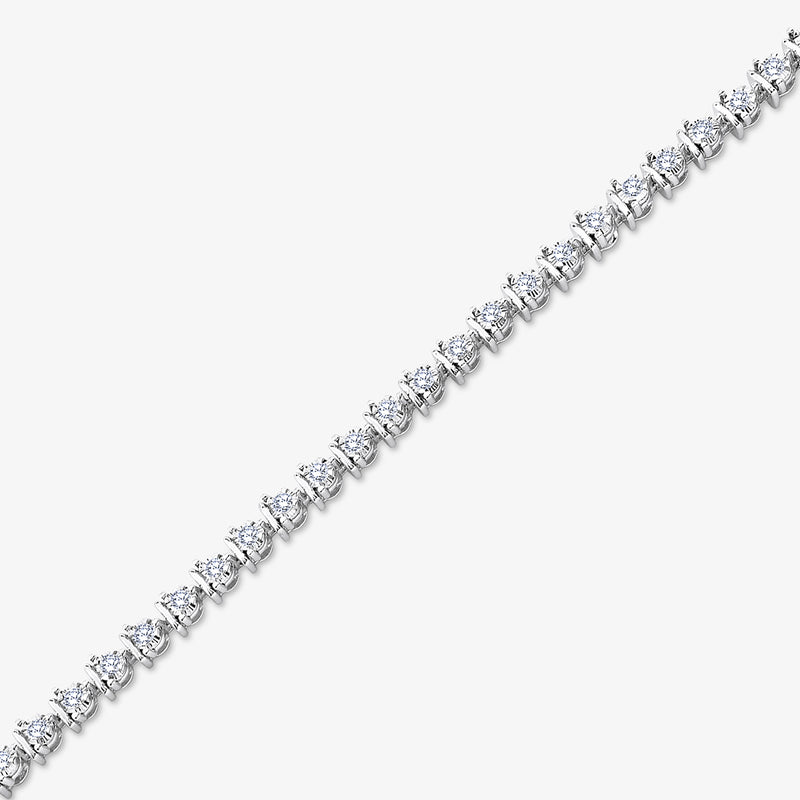 Keemti Jewels' Minimal Diamond Tennis Bracelet features round-cut stones in a sleek row on a white metal chain.