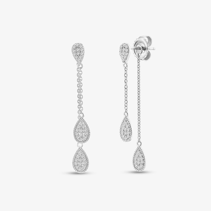 Keemti Jewels' Twin Pear Diamond Dangler Earrings showcase quiet luxury with three elegant drops against a plain backdrop.