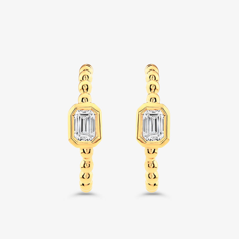 Luna Emerald Diamond Hoop Earrings by Keemti Jewels feature beaded hoops and emerald-cut diamonds on white.
