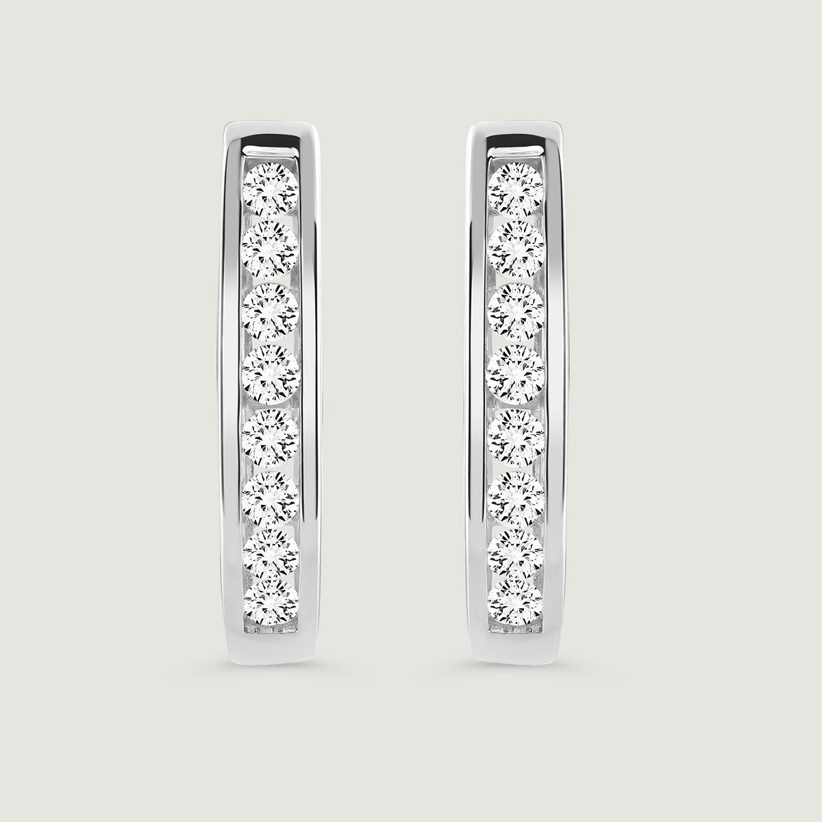 Keemti Jewels CLASSIC Row Hoop EARRINGS feature compact hoops with a row of round white diamonds for modern flair.