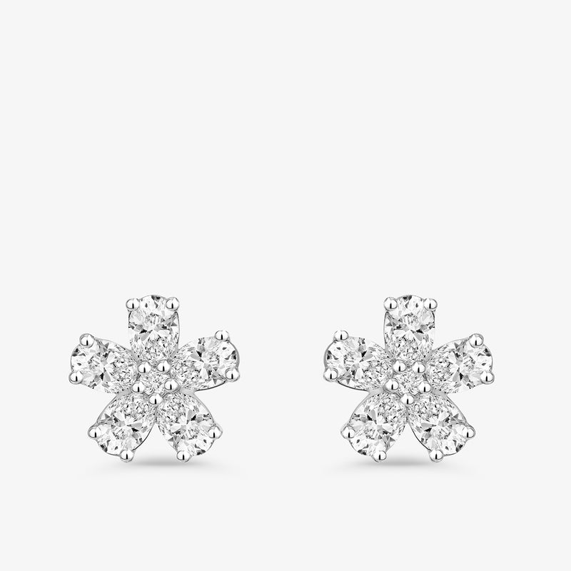 Quiet Bloom Diamond Stud Earrings by Keemti Jewels: six-petal diamond studs with a gentle sparkle in white metal.