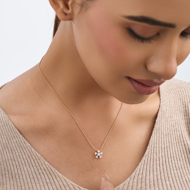 She wears Keemti Jewels' Daisy Glow Diamond Necklet, glancing down with a soft smile—everyday sparkle perfected.